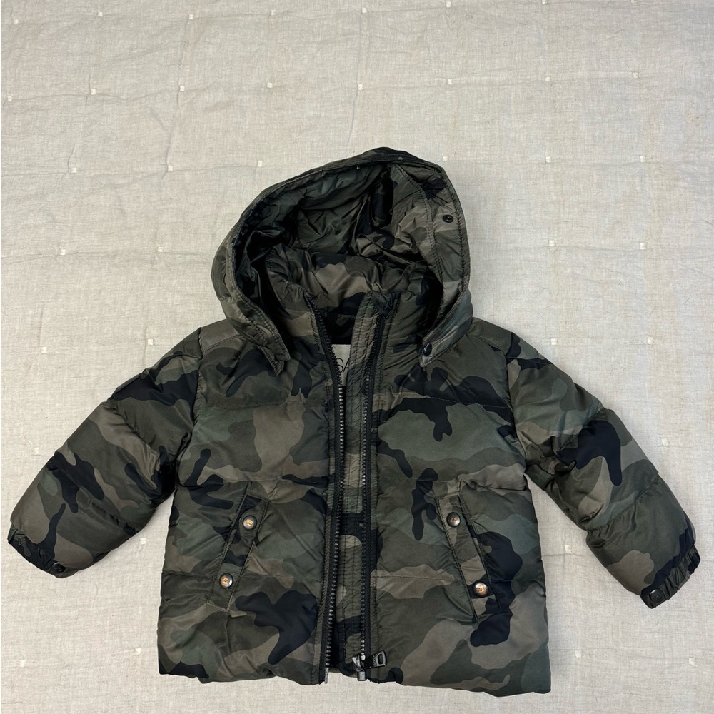 SAM. Little kid jacket comes with removable fur.